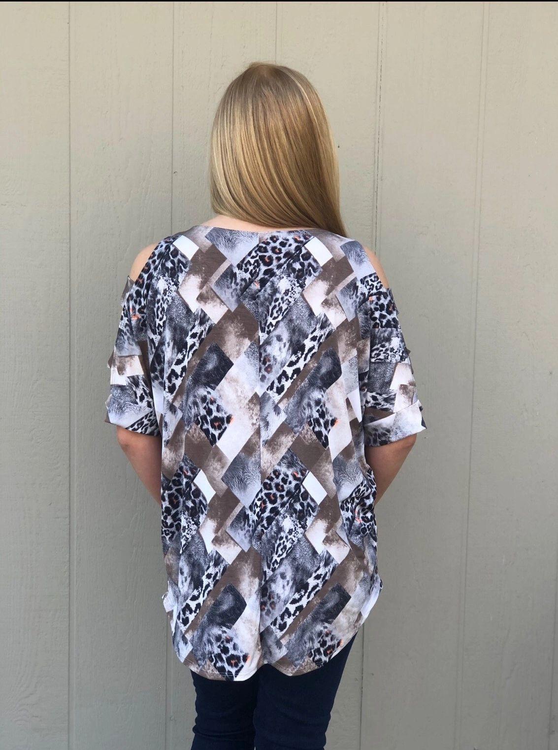 Animal Print Tunic w-Cut Out Sleeves and Rounded Neck